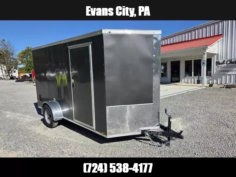 2025 Quality Cargo 6x12 Single Axle Enclosed Cargo Trailer 2990# GVW * 6'3 CEILING HEIGHT * CHARCOAL EXTERIOR * PLYWOOD WALLS AND FLOOR * RV DOOR * 16" O.C. * TUBE STUDS * RAMP DOOR * V-NOSE 1761310224