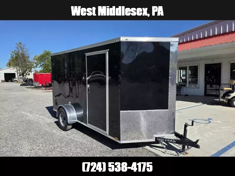 2026 Quality Cargo 6x12 Single Axle Enclosed Cargo Trailer 2990# GVW * BLACK .080 POLYCOR EXTERIOR * 6'3 CEILING HEIGHT * SEMI-SCREWLESS * PLYWOOD WALLS AND FLOOR * RV DOOR * 16" O.C. * TUBE STUDS * RAMP DOOR * V-NOSE 1768015816