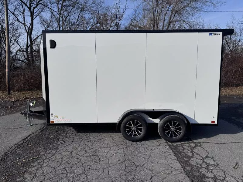 2026 ITI Cargo 7x14' Enclosed Cargo Trailer 7000# GVW * WHITE BLACKOUT EXTERIOR * SCREWLESS EXTERIOR * POLYCOR .080 * 7' HEIGHT * 6" TONGUE * ALUMINUM WHEELS * 1 PC ALUMINUM ROOF * TRUCKBED LINER ON TONGUE/SILLS * UNDERCOATED