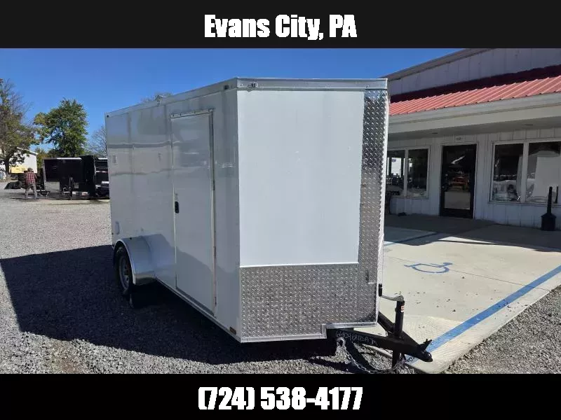 2025 Quality Cargo 6x12 Single Axle Enclosed Cargo Trailer 2990# GVW * 6'3 CEILING HEIGHT * WHITE EXTERIOR * PLYWOOD WALLS AND FLOOR * RV DOOR * 16" O.C. * TUBE STUDS * RAMP DOOR * V-NOSE 1760036751