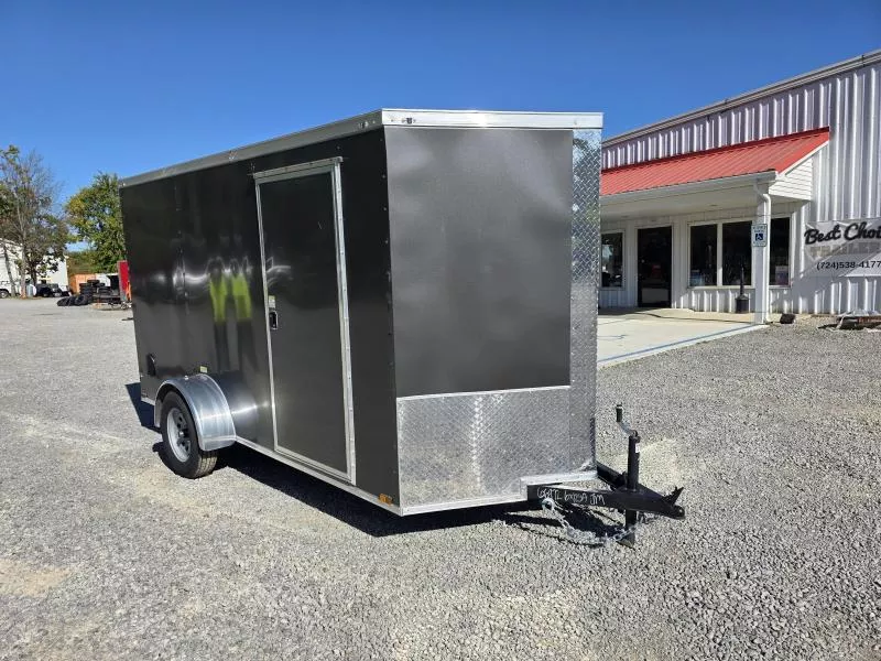 2025 Quality Cargo 6x12 Single Axle Enclosed Cargo Trailer 2990# GVW * 6'3 CEILING HEIGHT * CHARCOAL EXTERIOR * PLYWOOD WALLS AND FLOOR * RV DOOR * 16" O.C. * TUBE STUDS * RAMP DOOR * V-NOSE