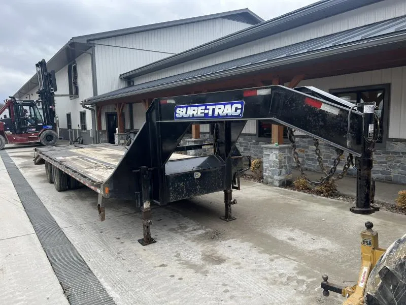USED 2023 Sure-Trac 102x25' Gooseneck Beavertail Deckover Trailer 25990# GVW * 12000# AXLES * FULL WIDTH RAMPS * 12" I-BEAM * PIERCED FRAME * RUBRAIL/STAKE POCKETS/PIPE SPOOLS/10 D-RINGS * CROSS TRAC BRACING * HD BEAVERTAIL