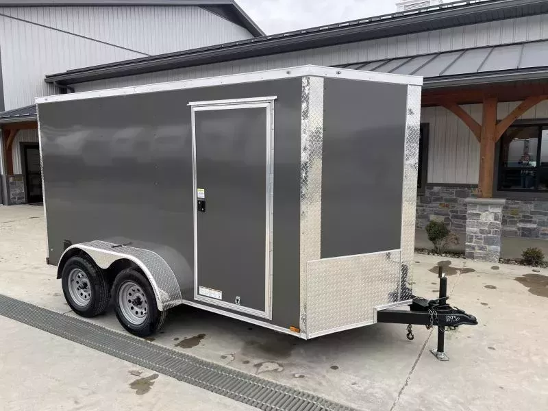 2026 Xtreme Cargo 6x12 Enclosed Cargo Trailer 7000# GVW * 6'3" HEIGHT * 16" O.C. FLOOR AND WALLS * CHARCOAL EXTERIOR * .080 POLYCOR SEMI-SCREWLESS * RV DOOR * PLYWOOD WALLS AND FLOOR * TUBE STUDS * D-RINGS