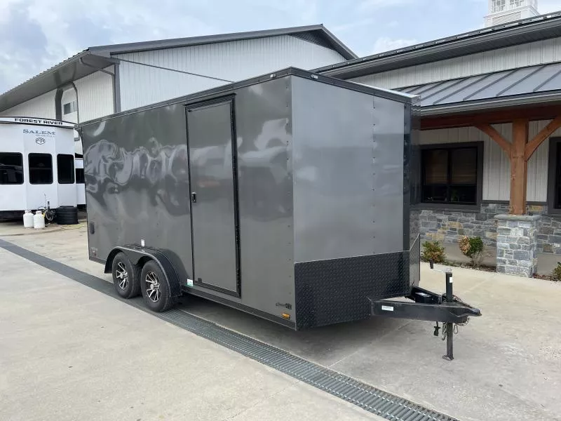 USED 2024 Cargo Mate 7.5X16 ENCLOSED CARGO TRAILER 7000 GVW * CHARCOAL BLACKOUT * SLANT V-NOSE * ALUMINUM WHEELS * .30 SCREWLESS EXTERIOR * REAR SPOILER * 