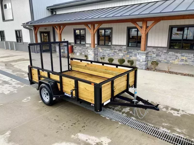 2026 Sure-Trac 6x10' High Side Utility Landscape Trailer 2990# GVW * 24" 3-BOARD HIGH SIDE * 2" TUBE TOP RAIL * 2X2" TUBE GATE C/M + SPRING ASSIST + FOLD FLAT * TOOLESS GATE REMOVAL * SPARE MOUNT * PROTECTED WIRING * SET BACK JACK