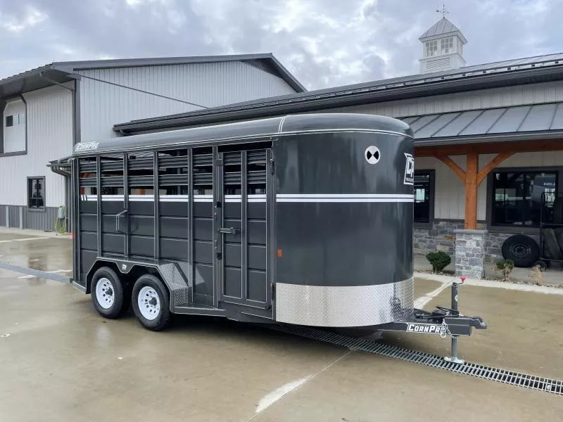 2025 Corn Pro 16' Livestock Trailer 7000# GVW * 7' HEIGHT / 7' WIDTH * GREY/CHARCOAL * TORSION SUSPENSION * DEXTER AXLES * 225/75/R15 8-PLY TIRES * HD FENDERS * CENTER AND REAR SLAM GATES * 4" CHANNEL TONGUE * URETHANE PAINT * KILN DRIED LUMBER