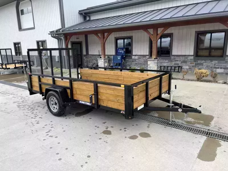 2026 Sure-Trac 7x12' High Side Utility Landscape Trailer 2990# GVW * 24" 3-BOARD HIGH SIDE * 2" TUBE TOP RAIL * 2X2" TUBE GATE C/M + SPRING ASSIST + FOLD FLAT * TOOLESS GATE REMOVAL * SPARE MOUNT * PROTECTED WIRING * SET BACK JACK