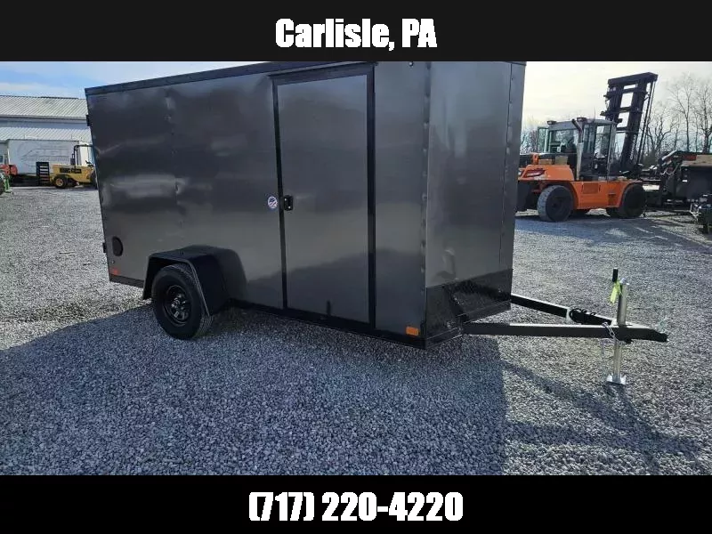 2026 ITI Cargo 6x12' Enclosed Cargo Trailer 2990# GVW * CHARCOAL BLACKOUT EXTERIOR * ALUMINUM WHEELS * 16" O.C. * SCREWLESS .030 EXTERIOR * RV DOOR * 1 PC ALUMINUM ROOF * TRUCKBED LINER ON TONGUE AND SILLS * UNDERCOATED * VAPOR BARRIER 1765038014