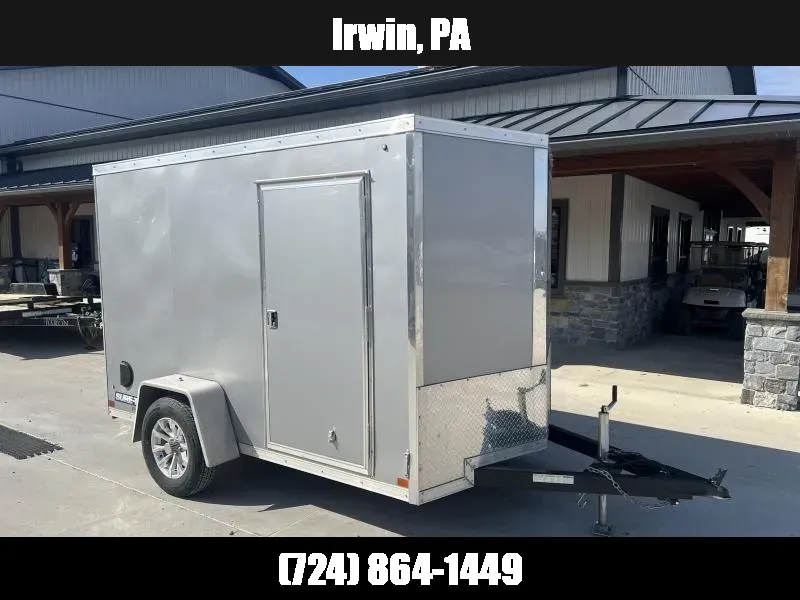 USED 2024 Sure-Trac 6x10' Pro Series Enclosed Cargo Trailer 2990# GVW * SILVER EXTERIOR * V-NOSE * RAMP * .030 SCREWLESS EXTERIOR * ALUMINUM WHEELS * 1 PC ROOF * 4" TUBE FRAME * 16" O.C. WALLS * TUBE STUDS * CEILING LINER * RV DOOR 1776449967