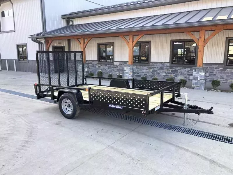 2026 Sure-Trac 7x12' ATV Utility Landscape Trailer 2990# GVW * 2" TUBE TOP RAIL * ATV RAMPS * FULL WRAP TONGUE * 2X2" TUBE GATE C/M + SPRING ASSIST + FOLD FLAT * SPARE MOUNT * PROTECTED WIRING * SET BACK JACK * TRIPLE TONGUE * STAKE POCKETS * CLEARANCE