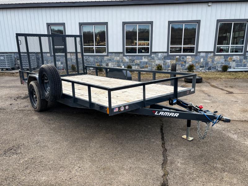 USED 2024 Lamar 7x14' Utility Landscape Trailer 5200# GVW * 5200# AXLE * ELECTRIC BRAKES * CHANNEL FRAME * SPARE TIRE MOUNT * CAST COUPLER * SWIVEL JACK * COLD WEATHER HARNESS * STAKE POCKETS * LAY FLAT/TUBE GATE W/SPRING ASSIST * LED LIGHTS