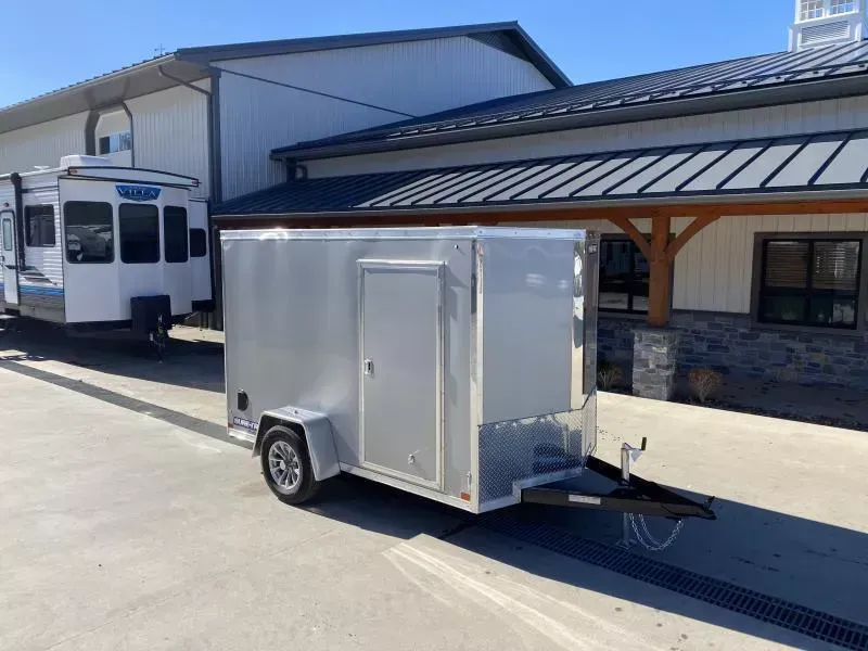 2026 Sure-Trac 6x10' Pro Series Enclosed Cargo Trailer 2990# GVW * SILVER EXTERIOR * V-NOSE * RAMP * .030 SCREWLESS EXTERIOR * ALUMINUM WHEELS * 1 PC ROOF * 4" TUBE FRAME * 16" O.C. WALLS * TUBE STUDS * CEILING LINER * RV DOOR
