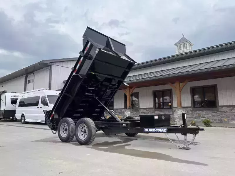 2025 Sure-Trac 6x10' Dump Trailer 9900# GVW * UNDERMOUNT RAMPS * COMBO GATE * 7K DROP LEG JACK * FRONT/REAR BULKHEAD * INTEGRATED KEYWAY * SPARE MOUNT * HD FENDERS * 4" TUBE BEDFRAME * TRIPLE TUBE TONGUE * POWDERCOATED