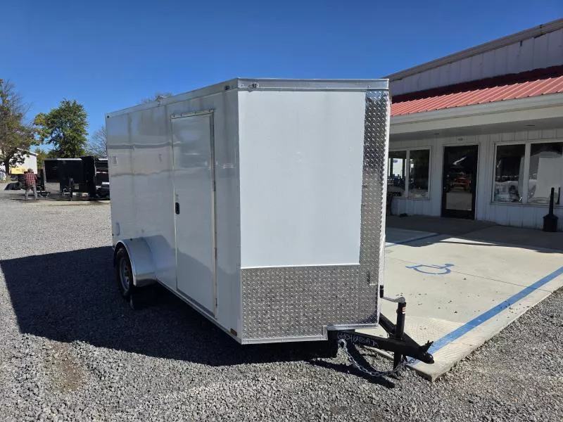 2025 Quality Cargo 6x12 Single Axle Enclosed Cargo Trailer 2990# GVW * 6'3 CEILING HEIGHT * WHITE EXTERIOR * PLYWOOD WALLS AND FLOOR * RV DOOR * 16" O.C. * TUBE STUDS * RAMP DOOR * V-NOSE