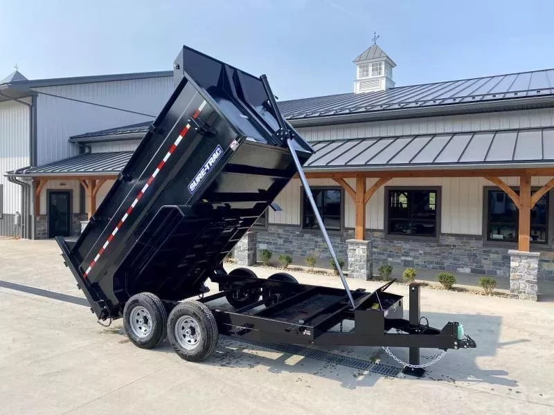 2026 Sure-Trac 7x16' Dump Trailer 14000# GVW * HYDRAULIC JACK * DELUXE TARP KIT * 4' HIGH SIDES + BULKHEAD * TELESCOPIC HOIST * INTEGRATED KEYWAY * UNDERBODY TOOL TRAY * ADJUSTABLE COUPLER * 110V CHARGER * UNDERMOUNT RAMPS