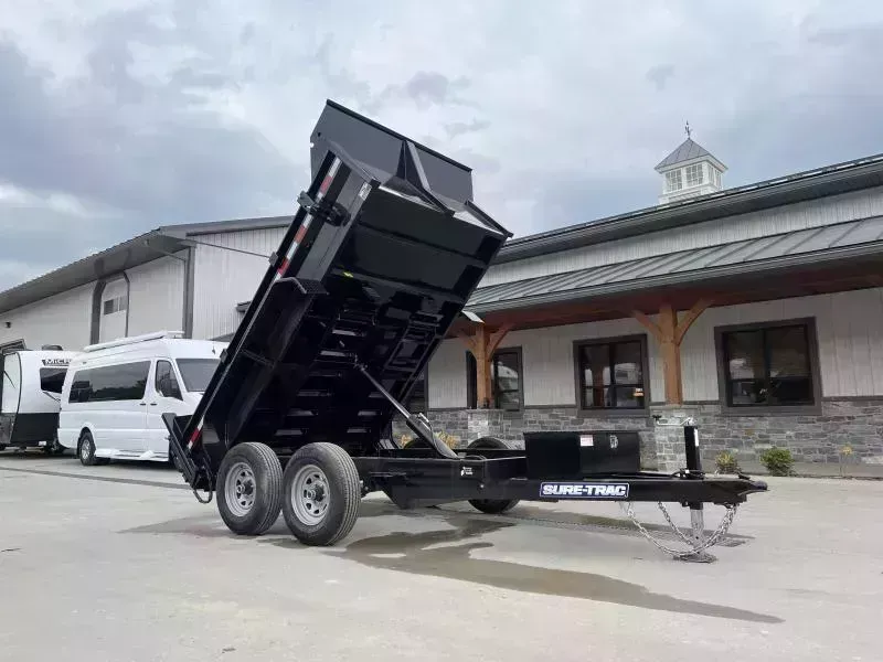 2026 Sure-Trac 6x10' Dump Trailer 9900# GVW * UNDERMOUNT RAMPS * COMBO GATE * 7K DROP LEG JACK * FRONT/REAR BULKHEAD * INTEGRATED KEYWAY * SPARE MOUNT * HD FENDERS * 4" TUBE BEDFRAME * TRIPLE TUBE TONGUE * POWDERCOATED