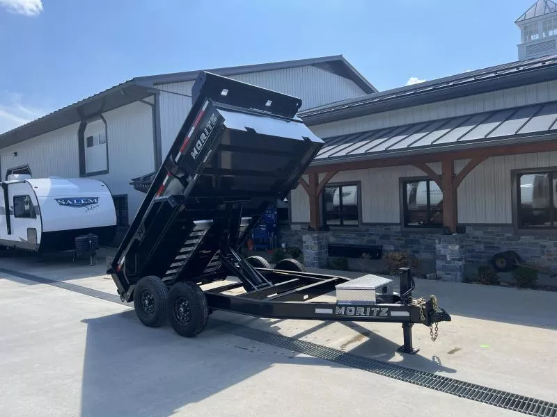 2025 Moritz 7x12' Low Profile Dump Trailer 14000# GVW * DEXTER AXLES * TORSION SUSPENSION * WET COAT PAINT * 24" SIDES * 8" I-BEAM FRAME * ALUMINUM RAMPS & TOOLBOX * 4-BOLT COUPLER * COMBO GATE * KEYWAY IN SIDES