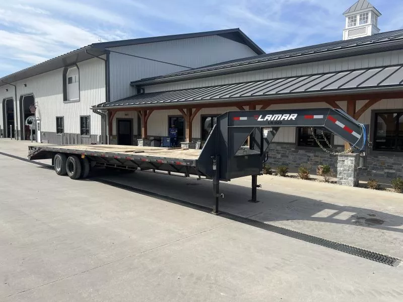 USED 2023 Lamar Trailers 102x32 24,000 GVW Deckover Trailer * FULL WIDTH RAMPS * WINCH TRACK AND STRAPS *DUAL JACKS * TOOLBOX * STAKE POCKET & RUB RAIL * SPARE TIRE MOUNT & SPARE TIRE * 