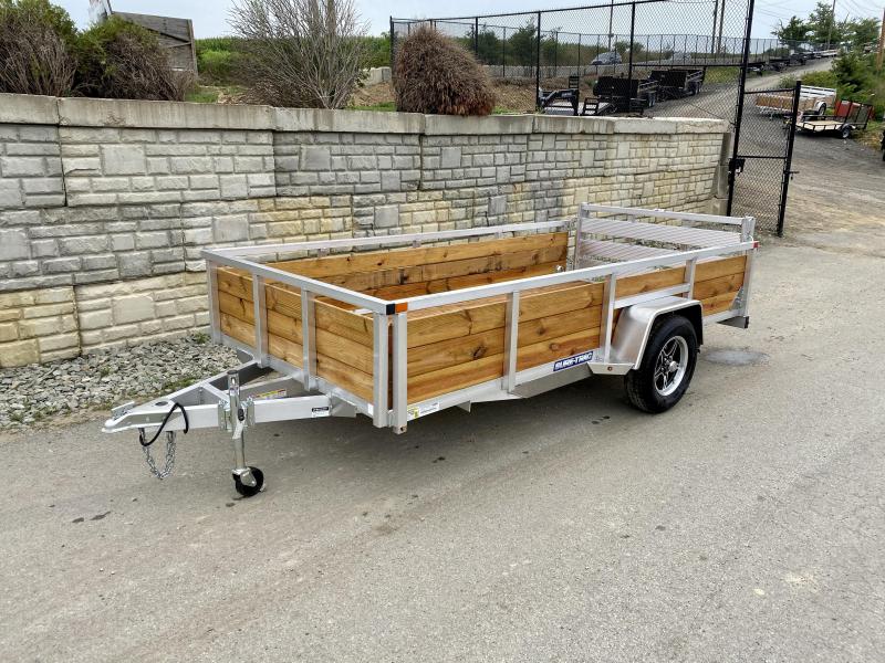 2021 Sure Trac 6x12' Aluminum Wood High Side Utility Landscape Trailer 2990# GVW * 2' HIGH SIDES * BI FOLD GATE * ALUMINUM WHEELS * TUBE TOP * TRIPLE TUBE TONGUE * TUBE TONGUE * SWIVEL JACKS * STAKE POCKETS * EXTENDED 54" GATE 2021 Sure Trac 6x12' Aluminum Wood High Side Utility Landscape Trailer 2990# GVW * 2' HIGH SIDES * BI FOLD GATE * ALUMINUM WHEELS * TUBE TOP * TRIPLE TUBE TONGUE * TUBE TONGUE * SWIVEL JACKS * STAKE POCKETS * EXTENDED 54" GATE