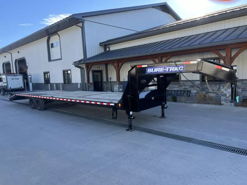 USED 2023 Sure-Trac 102x35' Gooseneck Beavertail Deckover Trailer 15000# GVW * DUAL JACKS * FULL TOOLBOX * FULL WIDTH RAMPS * 12" I-BEAM * PIERCED FRAME * (10) 4" D-RINGS/RUBRAIL/STAKES/PIPE SPOOLS * CROSS TRAC BRACING