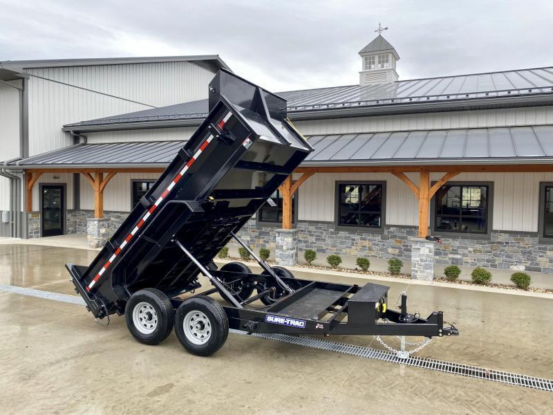 2023 Sure-Trac 7x12' Dump Trailer 12000# GVW * TARP KIT * DUAL PISTON * FRONT/REAR BULKHEAD * INTEGRATED KEYWAY * 2' SIDES * UNDERBODY TOOL TRAY * ADJUSTABLE COUPLER * 110V CHARGER * UNDERMOUNT RAMPS * COMBO GATE * 7K DROP LEG JACK 2023 Sure-Trac 7x12' Dump Trailer 12000# GVW * TARP KIT * DUAL PISTON * FRONT/REAR BULKHEAD * INTEGRATED KEYWAY * 2' SIDES * UNDERBODY TOOL TRAY * ADJUSTABLE COUPLER * 110V CHARGER * UNDERMOUNT RAMPS * COMBO GATE * 7K DROP LEG JACK