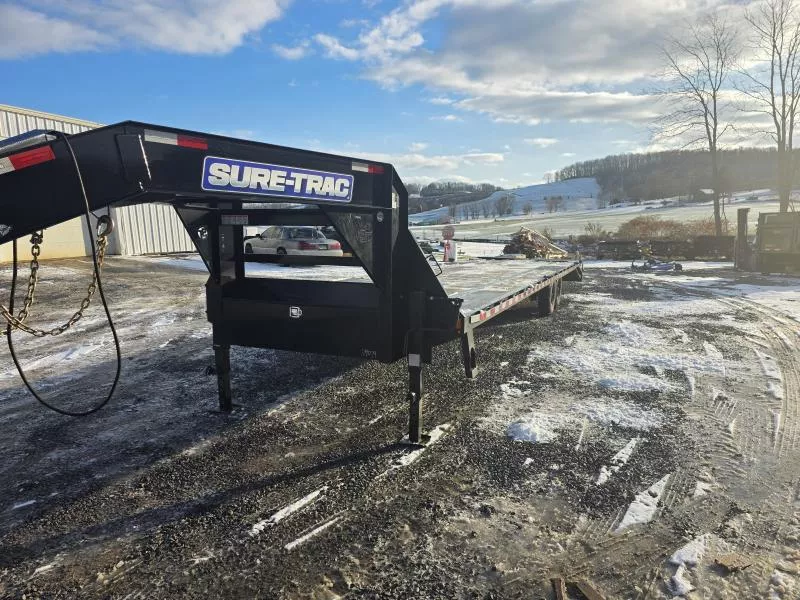 USED 2023 Sure-Trac 102x35' Gooseneck Beavertail Deckover Trailer 15000# GVW * DUAL JACKS * FULL TOOLBOX * FULL WIDTH RAMPS * 12" I-BEAM * PIERCED FRAME * (10) 4" D-RINGS/RUBRAIL/STAKES/PIPE SPOOLS * CROSS TRAC BRACING