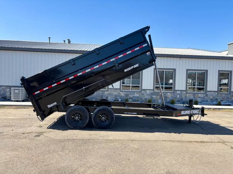 2026 Sure-Trac 7x14' Pro Series I-Beam Dump Trailer 15400# GVW * 7GA FLOOR * 4' HIGH SIDES * TELESCOPIC HOIST * FRONT/REAR BULKHEAD * OVERSIZE TOOLBOX * INTEGRATED KEYWAY * HD 4-BOLT COUPLER * 110V CHARGER * UNDERMOUNT RAMPS * 12K 2-SPEED JACK