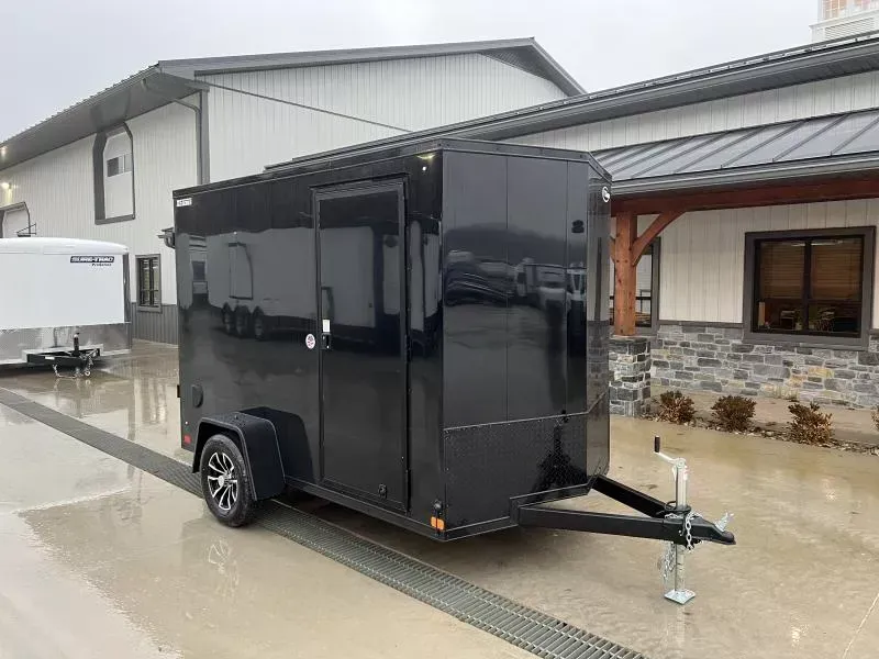2026 ITI Cargo 6x12' Enclosed Cargo Trailer 2990# GVW * 4" FRAME * 6'6" H * BLACK BLACKOUT EXTERIOR * SCREWLESS .030 EXTERIOR * BLACK ALUMINUM WHEELS * 16" O.C. WALLS * RV DOOR * 1 PC ROOF * TRUCKBED LINER ON TONGUE/SILLS * UNDERCOATED * VAPOR BARRIER