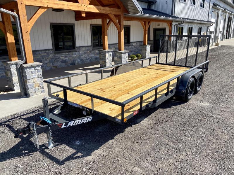 2021 Lamar 7x18' Deluxe Utility Landscape Trailer 7000# GVW * ADJUSTABLE COUPLER * PIPE TOP RAIL * 7K DROP LEG JACK * CHARCOAL * HD GATE/2X2" TUBE C/M + SPRING ASSIST * COLD WEATHER HARNESS * 4" CHANNEL TONGUE * STAKE POCKETS * TEARDROP FENDERS * BULLET L 2021 Lamar 7x18' Deluxe Utility Landscape Trailer 7000# GVW * ADJUSTABLE COUPLER * PIPE TOP RAIL * 7K DROP LEG JACK * CHARCOAL * HD GATE/2X2" TUBE C/M + SPRING ASSIST * COLD WEATHER HARNESS * 4" CHANNEL TONGUE * STAKE POCKETS * TEARDROP FENDERS * BULLET L