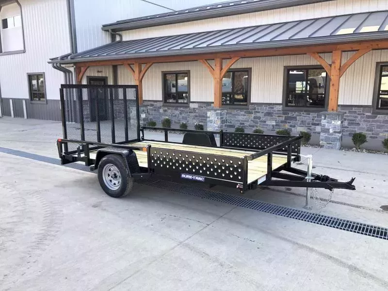 2026 Sure-Trac 7x14' ATV Utility Landscape Trailer 5000# GVW * 5200# AXLE WITH BRAKES * 2" TUBE TOP RAIL * ATV RAMPS * FULL WRAP TONGUE * 2X2" TUBE GATE C/M + SPRING ASSIST + FOLD FLAT * SPARE MOUNT * PROTECTED WIRING * SET BACK JACK * TRIPLE TONGUE