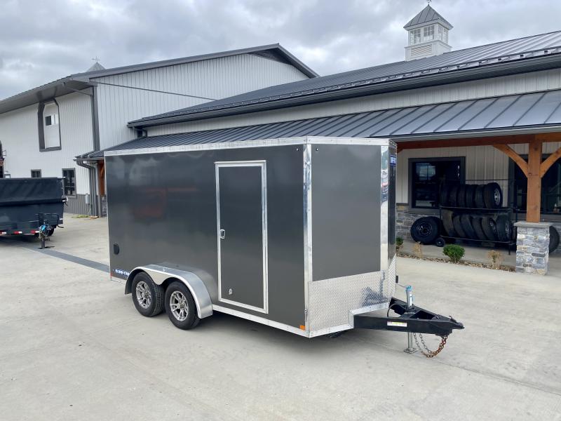 USED 2021 Sure-Trac 7x14' Enclosed Cargo Trailer 7000# GVW * SILVER * TORSION * SCREWLESS * ALUM WHEELS * 1PC ROOF * 6'6" H * SPARE TIRE * EPOXY FLOORING * SHELVING * D-RINGS USED 2021 Sure-Trac 7x14' Enclosed Cargo Trailer 7000# GVW * SILVER * TORSION * SCREWLESS * ALUM WHEELS * 1PC ROOF * 6'6" H * SPARE TIRE * EPOXY FLOORING * SHELVING * D-RINGS