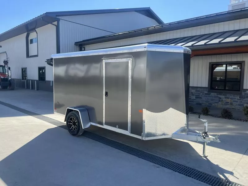 2026 Neo 6x12' NAVR Aluminum Enclosed Cargo Trailer 2990# GVW * CHARCOAL SCREWLESS EXTERIOR * DT SPOILER * ROUND TOP * CABLELESS RAMP DOOR * NXP RAMP DOOR * VENTS * ALUMINUM WHEELS * 1 PC ROOF * 24" STONEGUARD * 3/4" PLYWOOD FLOOR * LED LIGHTS