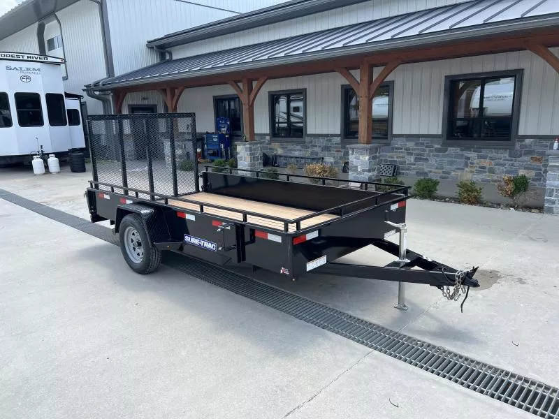 USED 2025 Sure-Trac 6x12' Solid Side Utility Landscape Trailer 2990# GVW * 2X2" TUBE GATE C/M + SPRING ASSIST * FOLD FLAT GATE * TOOLESS GATE REMOVAL * SPARE MOUNT * PROTECTED WIRING * SET BACK JACK * HD FENDERS * TUBE BUMPER * HIGH SIDE