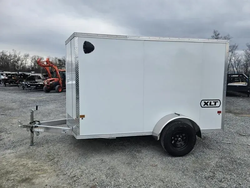 2026 EZ Hauler 6x12' Aluminum Enclosed Cargo Trailer 2990# GVW * WHITE .080 POLYCOR EXTERIOR * ALUMINUM WHEELS * SCREWLESS * ONE PC ROOF * DEXTER AXLES * RV DOOR * RAMP DOOR
