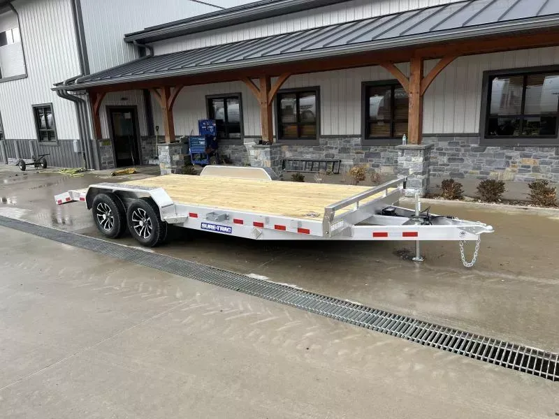 2026 Sure-Trac 7x18' Aluminum Wood Deck Car Hauler 7000# GVW * TOOLBOX * SWIVEL D-RINGS * REAR SLIDE OUT POOCH PLATE RAMPS * SEALED WIRING HARNESS * STAKE POCKETS * 2' DOVETAIL * ALUMINUM WHEELS * SPARE TIRE MOUNT