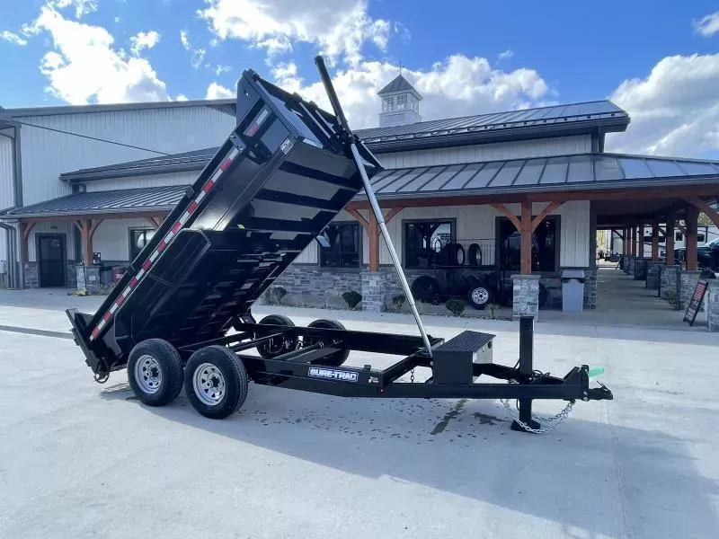 2026 Sure-Trac 6x12' Dump Trailer 9900# GVW * TELESCOPIC HOIST UPGRADE * 12K JACK * ADJUSTABLE COUPLER * 110V CHARGER * REAR STABILIZER JACKS * UNDERMOUNT RAMPS * COMBO GATE * 7K DROP LEG JACK * FRONT/REAR BULKHEAD * INTEGRATED KEYWAY