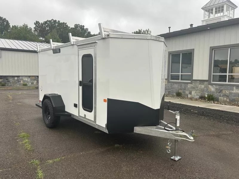 2026 Neo 5x12' NAR Aluminum Enclosed Recreation Trailer 2990# GVW * WHITE EXTERIOR * ALUMINUM WHEELS * OFF-ROAD RUBBER * 1 PC ROOF * SCREWLESS EXTER * BARN DOOR * FINISHED WALLS/CEILING * RACKS FOR TOYS * 110V OUTLET/MOTOR BASE * SIDE DOOR