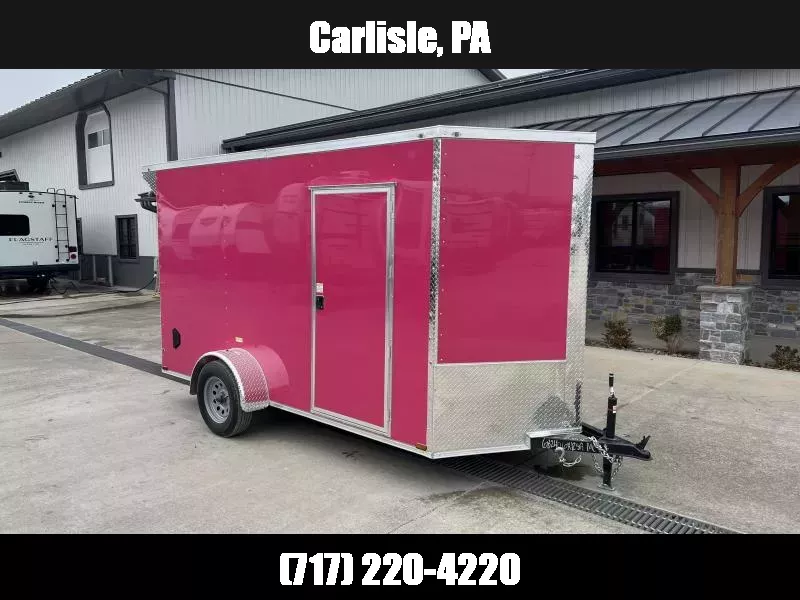 2026 Quality Cargo 6x12 Single Axle Enclosed Cargo Trailer 2990# GVW * 6'9" CEILING HEIGHT * REAR SPOILER + LOADING LIGHTS * .080 POLCYOR * PINK EXTERIOR * PLYWOOD WALLS AND FLOOR * RV DOOR * 16" O.C. * TUBE STUDS * RAMP DOOR * V-NOSE 1761580483