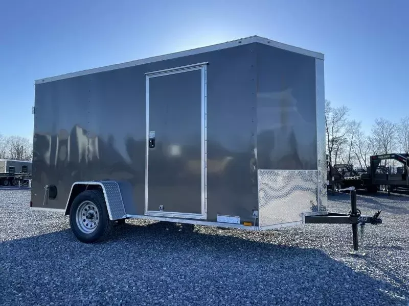 2025 Xtreme Cargo 7x12' Enclosed Cargo Trailer 2990# GVW * BARN DOORS * 6'6" HEIGHT * 16" FLOOR CROSSMEMBERS * CHARCOAL EXTERIOR * .080 POLYCOR SEMI-SCREWLESS * RV DOOR * PLYWOOD WALLS AND FLOOR * TUBE STUDS