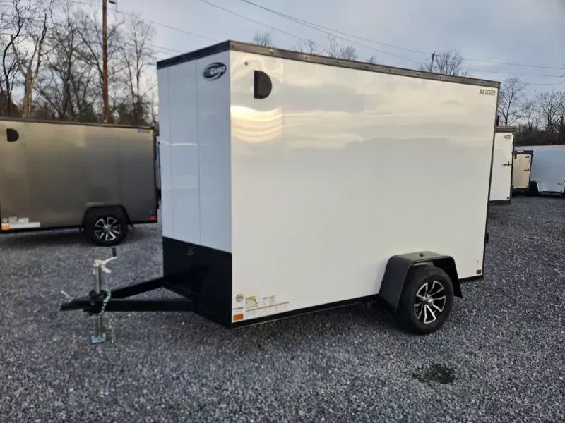 2026 ITI Cargo 6x10' Enclosed Cargo Trailer 2990# GVW * 4" FRAME * 6'6" H * SILVER BLACKOUT EXTERIOR * SCREWLESS .030 EXTERIOR * BLACK ALUMINUM WHEELS * 16" O.C. WALLS * RV DOOR * 1 PC ROOF * TRUCKBED LINER TONGUE & SILLS * UNDERCOATED * VAPOR BARRIER