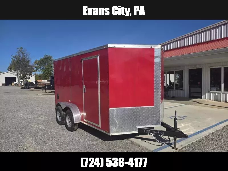2025 Quality 7x12' Single Axle Enclosed Cargo Trailer 3500# GVW * .080 POLYCOR * ORANGE EXTERIOR * RAMP DOOR * PLYWOOD WALLS & FLOORS * TUBE WALL AND CEILING STUDS * LED LIGHTS * 16" O.C. WALL AND FLOORS * RV DOOR * V-NOSE * 1763390257