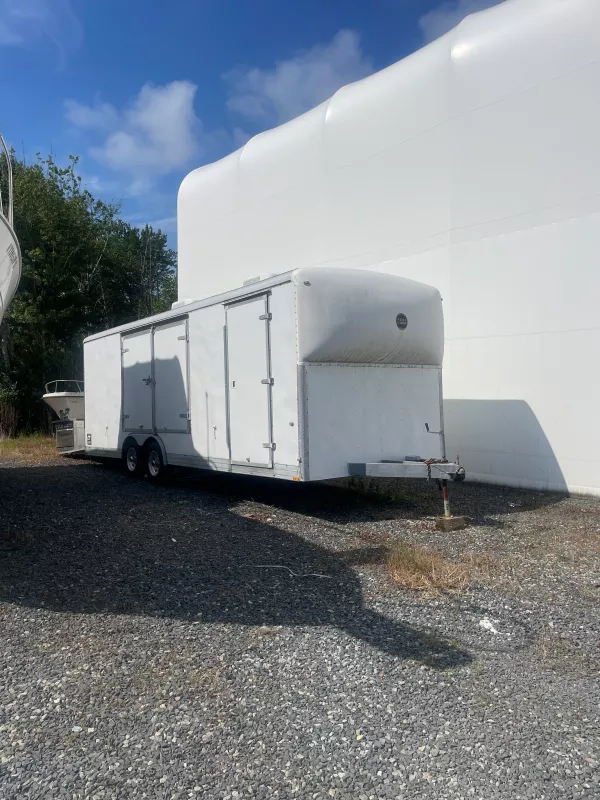 Wells cargo enclosed 24 with built in heat AC & generator