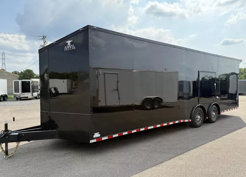 2026 Anvil 8.5x28 Torsion Spread - BlackOut .080 PolyCore Ext - Wing - Escape Door - 7.5' Int Ht Enclosed Car Hauler Trailer