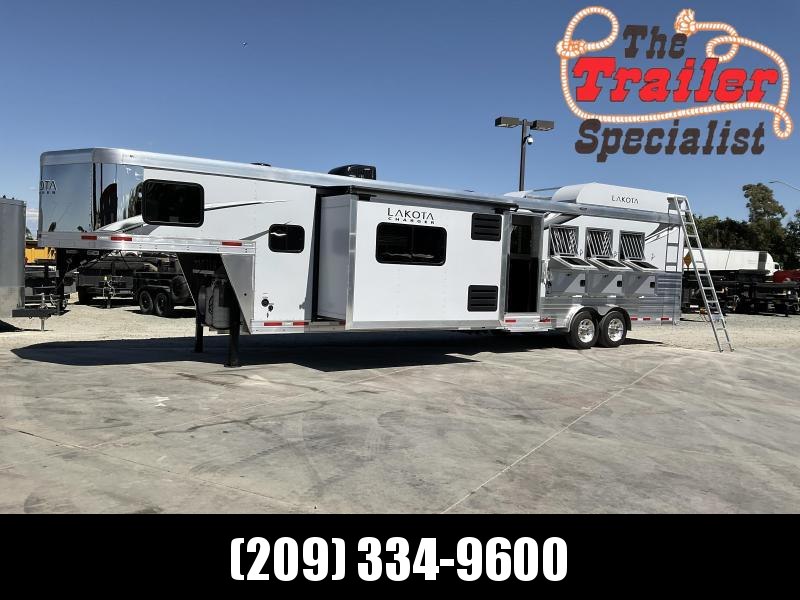 NEW 2022 Lakota 4 HORSE CHARGER GN LQ Horse Trailer With Sofa At Riser Wall, 8' wide and 15' LQ NEW 2022 Lakota 4 HORSE CHARGER GN LQ Horse Trailer With Sofa At Riser Wall, 8' wide and 15' LQ