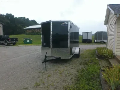2027 American Hauler Arrow 6X10 Deluxe Anniversary Edition