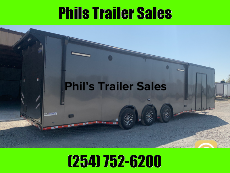 CLOSE OUT 1 ONLY 34 ENCLOSED RACE TRAILER ELECTRIC AWNING AND WHEEL