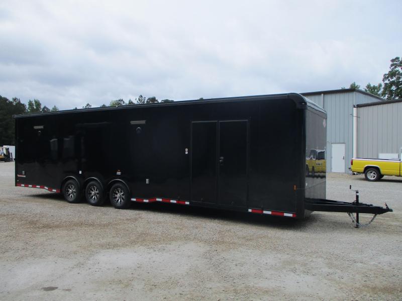 BLACKOUT 2022 Cargomate Eliminator SS 34' with Cabinets on the Sidewall BLACKOUT 2022 Cargomate Eliminator SS 34' with Cabinets on the Sidewall