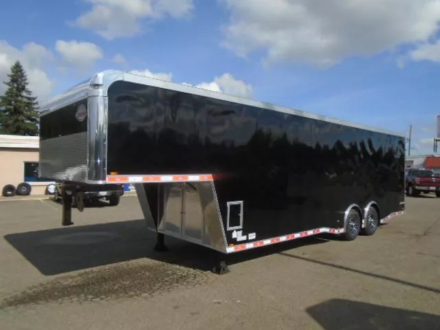2024 Cargo Mate Eliminator 8.5x32 14K With 12" Extra Height / D-Rings / Spread Axles / Landing Gear Access Doors / Screwless Ext / Vents / Ramp Door