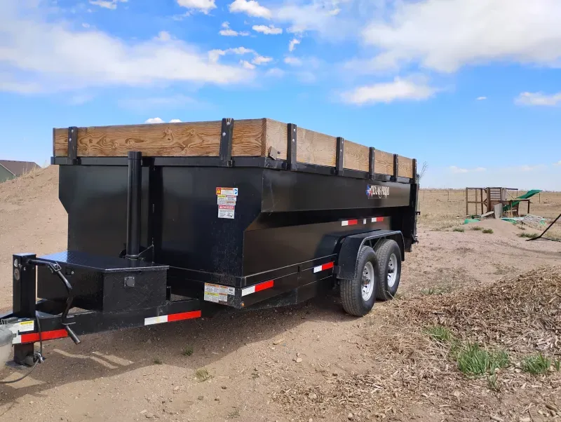 2023 Texas Pride Dump Trailer with upgrades and barely used! Ready to work today!
