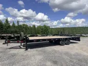 2026 Delco 102" x 24' 14,000lb GVWR Deckover Equipment Trailer w/ Monster Ramps!